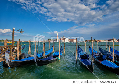 Gondolas and in lagoon of Venice by San Marco square. Venice, Italy Gondolas and in lagoon of Venice by San Marco square. Venice, Italy 90226434