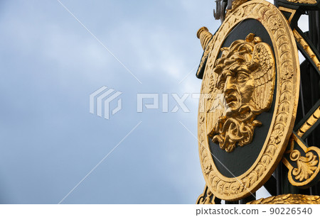 Decoraion of street light in St.Petersburg, Russia. Medusa face Decoraion of street light in St.Petersburg, Russia. Medusa face 90226540