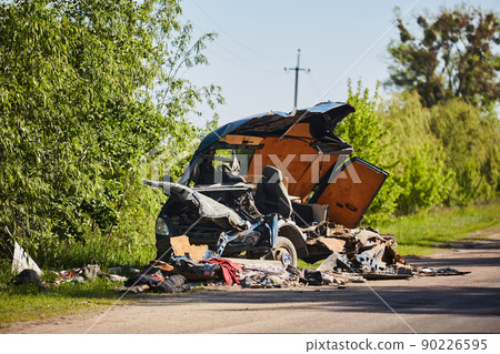 Burnt car of civilians. People were shot by Russian soldiers. May, 2022 90226595