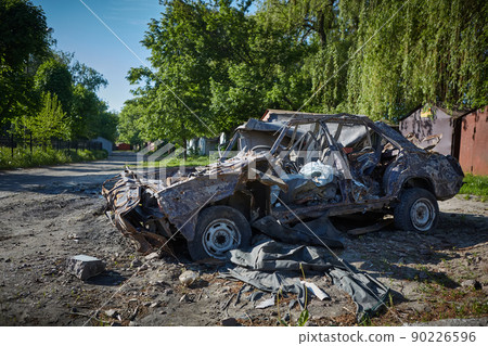 Burnt car of civilians. People were shot by Russian soldiers. May, 2022 90226596