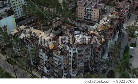 Irpin, Ukraine - May 15, 2022: Destroyed buildings on the streets of Irpen. Irpin, Ukraine - May 15, 2022: Destroyed buildings on the streets of Irpen. 90226706