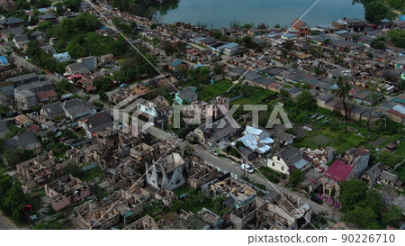Irpin, Ukraine - May 15, 2022: Destroyed buildings on the streets of Irpen. Irpin, Ukraine - May 15, 2022: Destroyed buildings on the streets of Irpen. 90226710