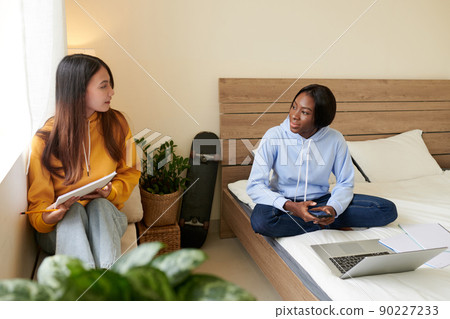 Teenage Girls Studying Together 90227233