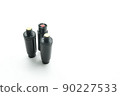 Aerosol pepper cartridges for a protective gun. Means of self-defense against attacks by aggressive people and animals. Selective focus, isolated on white, copy space 90227533