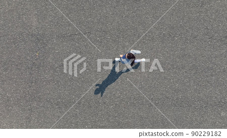 Aerial view of a woman jogging 90229182