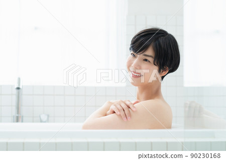 A young lady bathing 90230168