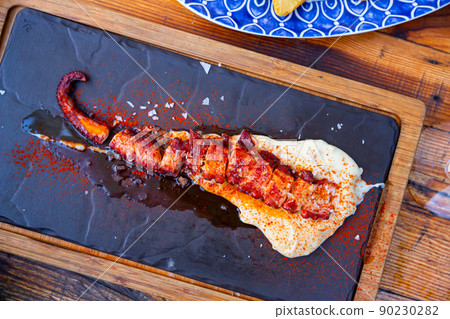 Grilled octopus with potato parmentier 90230282