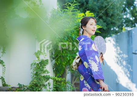 A woman in a yukata A woman in a yukata 90230393