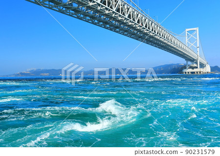 Onaruto Bridge and whirlpools under clear skies 90231579