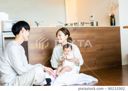 Happy family with baby 90232002