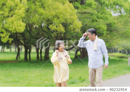 Active senior walking couple 90232954