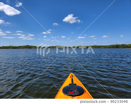 Orange kayak on Nine Mile Pond in Everglades National Park, Florida. 90233046