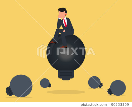 Businessman sitting on a light bulb and  thinking. 90233309