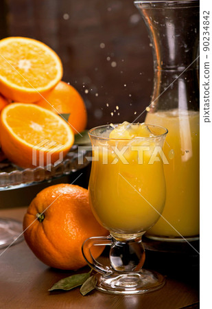 glass of fresh orange juice with fresh fruits on wooden glass of fresh orange juice with fresh fruits on wooden 90234842