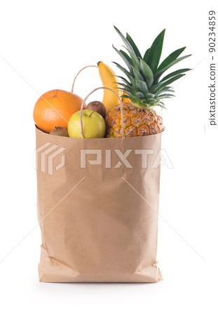 Fruits and vegetables in paper grocery bag isolated over white Fruits and vegetables in paper grocery bag isolated over white 90234859