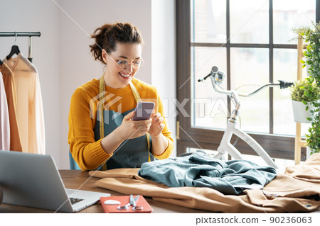 Woman is working at workshop 90236063