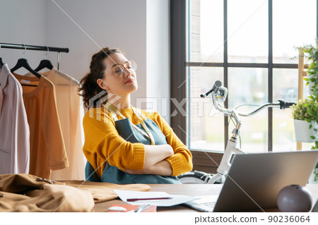 Woman is working at workshop 90236064