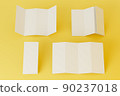 A4. Blank trifold paper brochure mock-up on yellow background with soft shadows. 3D illustration 90237018