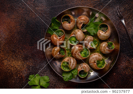 Bourgogne Escargot Snails with herb garlic oil. 90237977