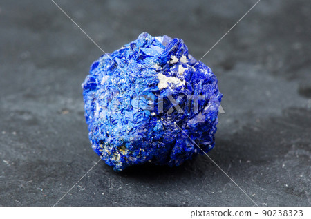 Azurite. Mineral stone on a dark background Azurite. Mineral stone on a dark background 90238323