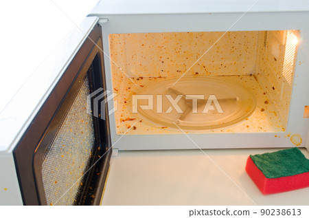 Open microwave. Dirt from food inside Open microwave. Dirt from food inside 90238613