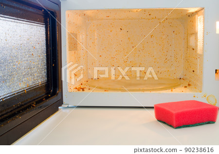 Open microwave. Dirt from food inside Open microwave. Dirt from food inside 90238616