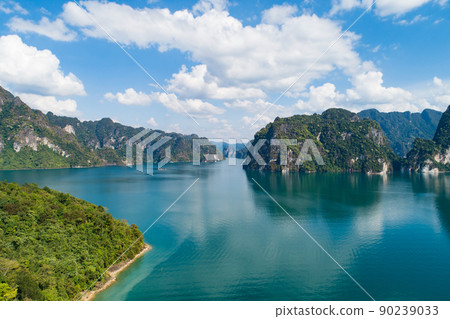 Aerial drone view of tropical Mountain peak in Thailand Beautiful archipelago islands Thailand Scenic mountains on the lake in Khao Sok National Park amazing nature landscape 90239033
