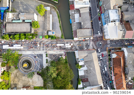 Aerial view Drone flying over phuket city Thailand.Drone over a street night market in Sunday at Phuket Town and Tourists walking shopping at old street full of local vendors selling Food and Clothes 90239034