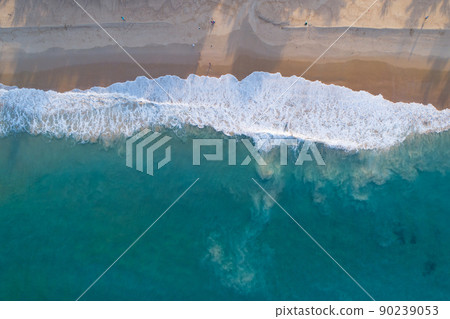 Aerial view sandy beach and waves Beautiful tropical sea in the morning summer season image by Aerial view drone shot, high angle view Top down sea waves Aerial view sandy beach and waves Beautiful tropical sea in the morning summer season image by Aerial view drone shot, high angle view Top down sea waves 90239053