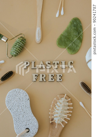 PLASTIC FREE text around Natural skin care products on neutral beige background, flat lay. Concept of organic, zero waste, eco friendly cosmetics Spa Background Sustainable lifestyle PLASTIC FREE text around Natural skin care products on neutral beige background, flat lay. Concept of organic, zero waste, eco friendly cosmetics Spa Background Sustainable lifestyle 90241787