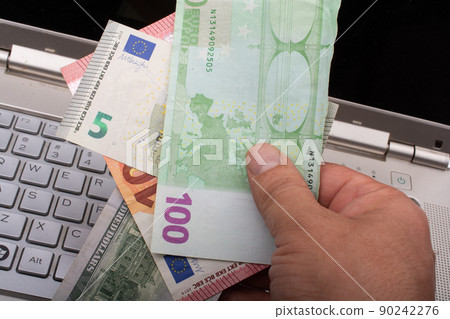 Hands holding cash euro banknotes currencies. Hands holding cash euro banknotes currencies. 90242276