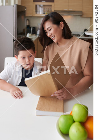 Mother and Son Reading Book Mother and Son Reading Book 90242584