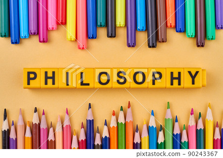 Word philosophy written on yellow cubes in frame made from colorful pencils. Word philosophy written on yellow cubes in frame made from colorful pencils. 90243367