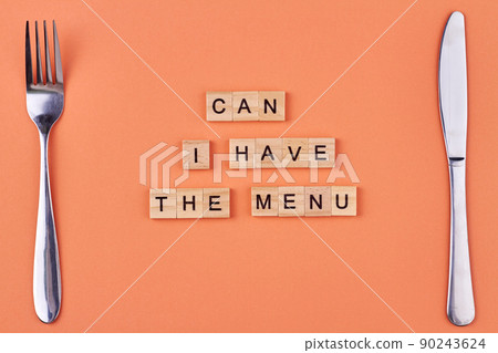 Fork, knife and text Can I have the menu written on wooden cubes. 90243624