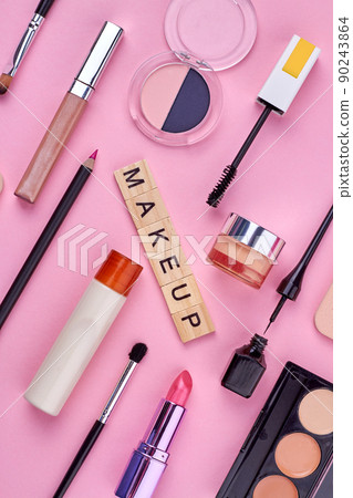 Flat lay composition with decorative cosmetic products. 90243864