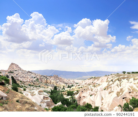 Carved houses in rock, Pigeon Valley, Uchisar, Cappadocia, Turkey 90244191