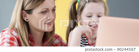 Smiling mum and happy little girl Smiling mum and happy little girl 90244507
