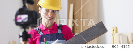 Portrait of professional female worker holding laminate Portrait of professional female worker holding laminate 90244565