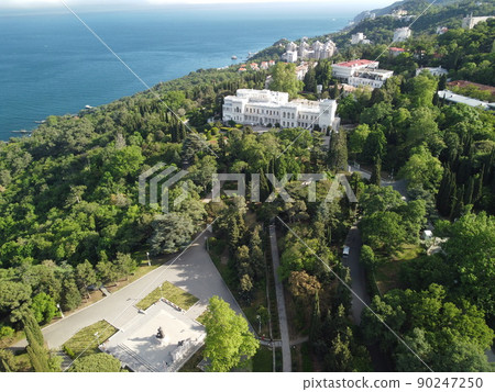 Aerial View of Livadia Palace - located on the shores of the Black Sea in the village of Livadia in the Yalta region of Crimea. Livadia Palace was a summer retreat of the last Russian tsar Nicholas II Aerial View of Livadia Palace - located on the shores of the Black Sea in the village of Livadia in the Yalta region of Crimea. Livadia Palace was a summer retreat of the last Russian tsar Nicholas II 90247250