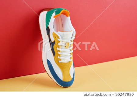 Trendy sneakers on creative colorful background, Stylish fashionable minimalism concept 90247980