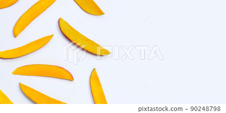 Tropical fruit, Mango  slices on white background. 90248798