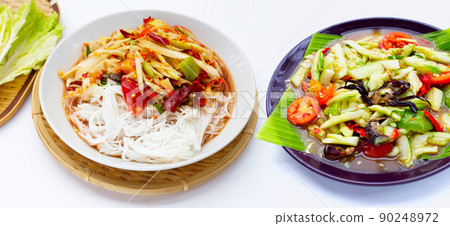 Spicy green papaya salad with vermicelli and  Spicy cucumber salad 90248972