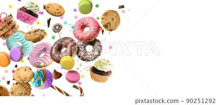 Confectionery and sweets levitation collage. Donuts, cupcakes, cookies, macarons flying over white background. 90251292