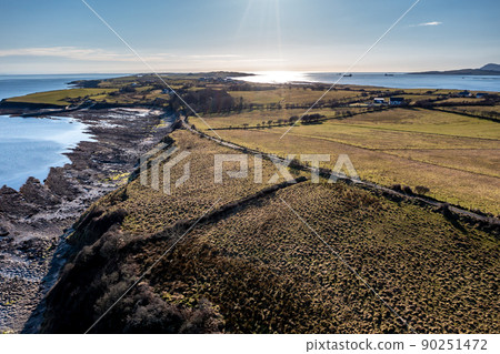 Aerial view of the amazing rocky coast at Ballyederland by St Johns Point in County Donegal - Ireland. Aerial view of the amazing rocky coast at Ballyederland by St Johns Point in County Donegal - Ireland. 90251472
