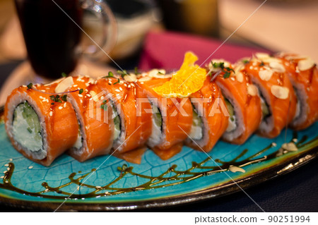 Asian food sushi and rolls with white cream cheese wrapped in red fish Asian food sushi and rolls with white cream cheese wrapped in red fish 90251994