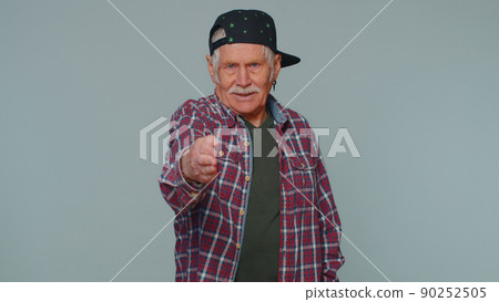 Friendly man outstretching hand to camera, offering handshake, greeting with kind smile, welcoming 90252505