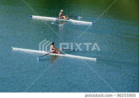 Two loosely floating single sculls Two loosely floating single sculls 90253808
