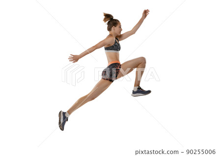 Development of movements in long jump sport. One professional female athlete in sports uniform jumping isolated on white background. Development of movements in long jump sport. One professional female athlete in sports uniform jumping isolated on white background. 90255006