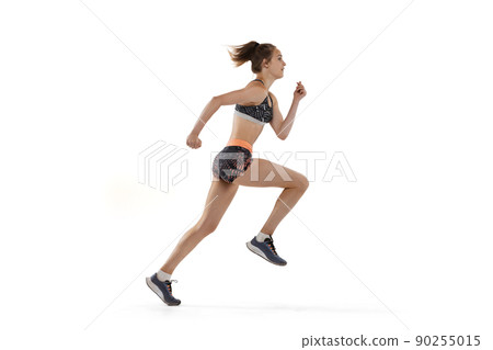Development of movements in long jump sport. One professional female athlete in sports uniform jumping isolated on white background. Development of movements in long jump sport. One professional female athlete in sports uniform jumping isolated on white background. 90255015