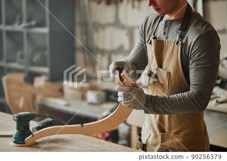 Carpenter Shaping Wood 90256379